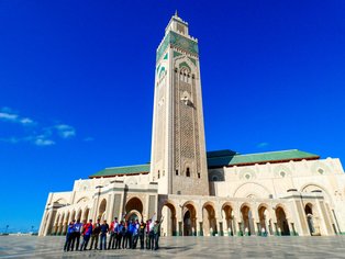 A motorcycle group in Morocco visits the Hassan II Mosque in Casablanca